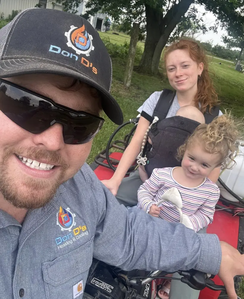 Donny DeOrnellis, owner of Don D's Heating & Cooling, with his family